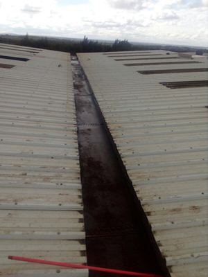 Here we have a rusty, worn down vally before being treated with Owl Lava 20 liquid waterproofing membrane. 